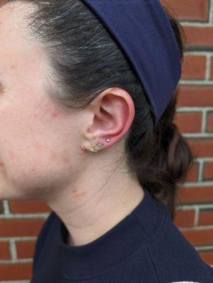 New piercing - third on lobe, gold star