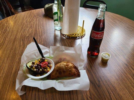 The combo with a Market Fresh, a Bean, a stuffed avocado, and a Mexican Coke.