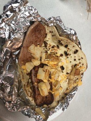 Spam, potato, cheese taco with just made flour tortilla.