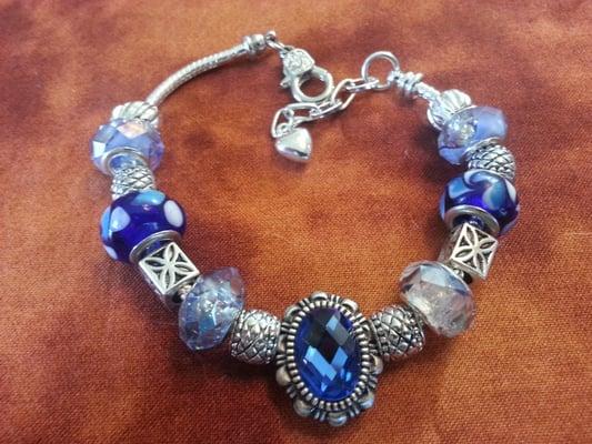 This bracelet sparkles so brightly you'll be stopping traffic!It has a beautiful arrangement of different blue beads and silver