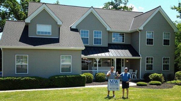 GAF American Harvest Series shingle with custom fabricated metal accent roof.