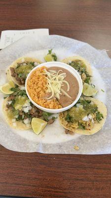 Real street tacos that are yummy. You are able to press them how ever you want from their toppings bar.