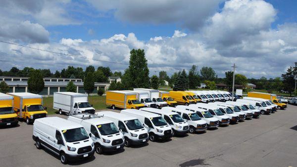 A Typical Lineup On The Lot. Lots of Cargo Vans And Cutaways. OnLine Auto Has Commercial Vehicles For Any Job!