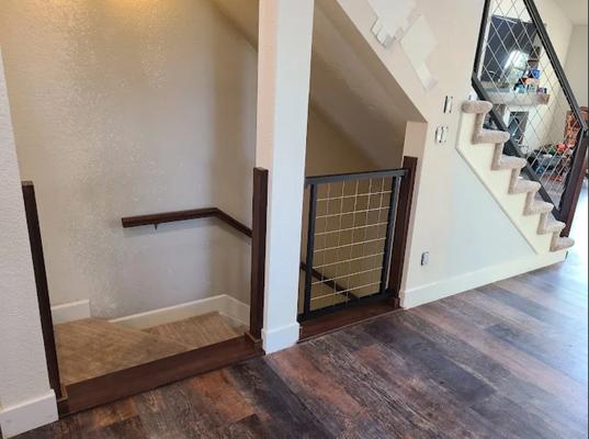 Custom stair gate & railing by Aloha State Builders, Inc.--Colorado's trusted experts in home remodeling & modern design.