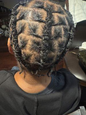Starter loc and style on short hair.