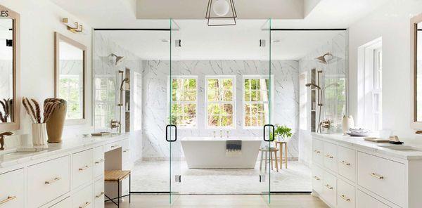 Frameless shower enclosure.