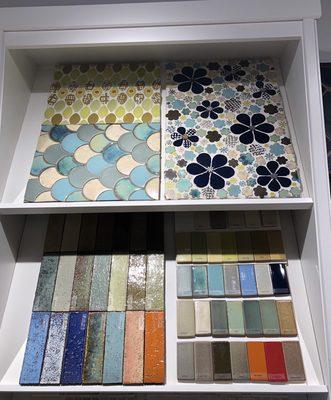 Hand made brick & ceramic tile from local artists in a variety of shapes, sizes and colors. Design your own and she'll create it for you