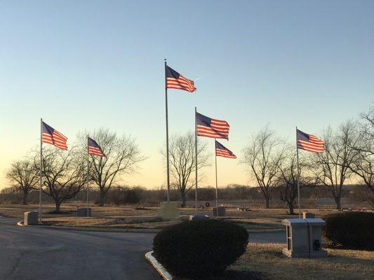 These are the flags that caught my eye while driving past. Beautiful at sunset, looking west.