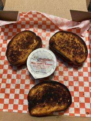 Overcooked, hard and cold garlic bread