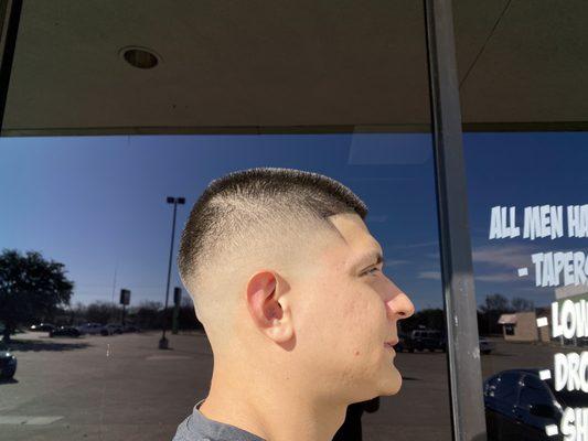 Nice crisp mid fade very clean and friendly service