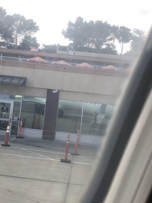 Can see part of the plane reflected in the windows