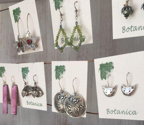 Earrings by Lennie Poitras.