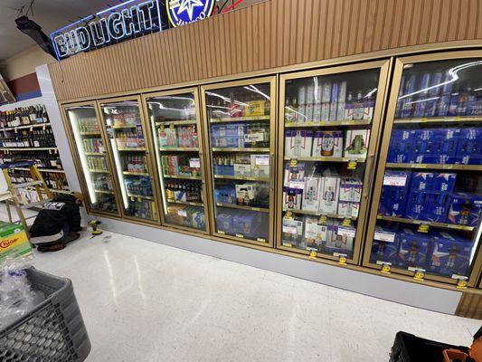 Before and after beer cooler graphics, designed, printed and installed.