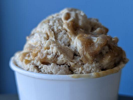 Banana Foster Ice Cream - Banana ice cream with bananas sauteed in run, brown sugar, mixed with caramel and ribboned throughout!