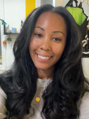 Hair styled beautifully.