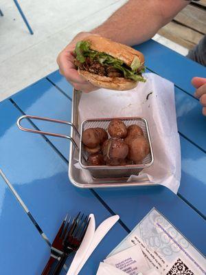 Soft shell crab sandwich with side of potatoes