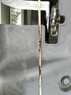 Another view of the dirty oil showing buildup and sludge on the dipstick only 3 months after Lakewood 76 performed the oil change.