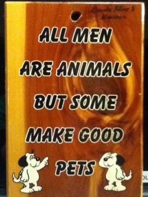 Funny sexist antique souvenir sign.