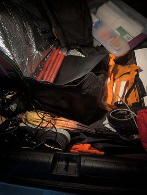 I would never move my flares and stack them neatly and throw my shopping bags in there too. Whole trunk was rummaged through.