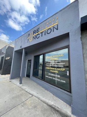 Outside of studio, showing clean windows and front