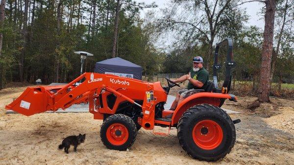 My Kubota L2502HST delivered just in time to lay out some rock.