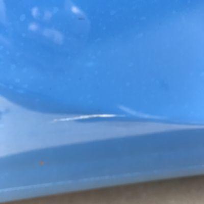 Damaged car from Ultimate Carwash.