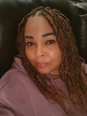 Senegalese twists....colors 27 and 30 mixed....Professional...comfortable atmosphere. Good parking. Glad I found her!