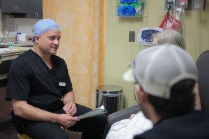 Dr. Monteith consulting with patients.