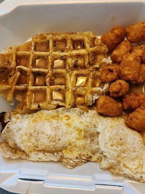Lemon Curd (more like lemon syrup - lemon flavor and sugar) eggs, bacon, tots, and waffle.