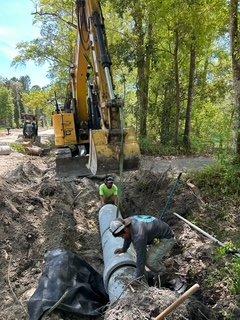 Pipe crew getting a storm drain done.