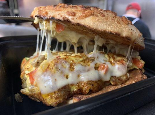 Western sandwich on an Asiago cheese bagel