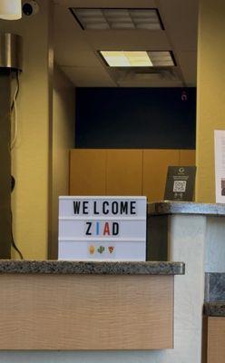 They welcome you with a custom sign with your name!