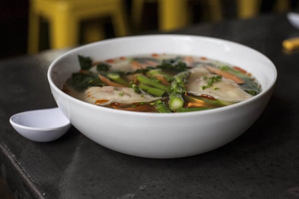 Pork dumpling and asparagus soup