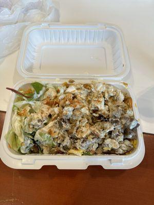 Combo over rice with lots of white sauce:o