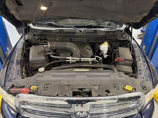 Looking at a Ram 1500 engine bay about to upgrade to a cold air intake system