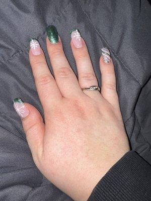 Highly recommend this shop! Everyone is so sweet and did an excellent job giving me my Christmas nails!!