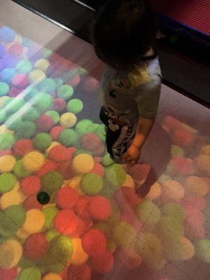 Interactive ball pit game