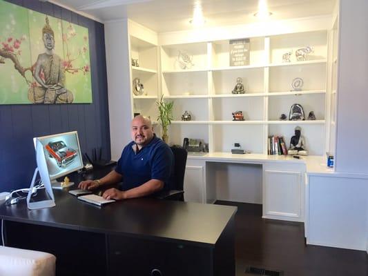 Owner of Cyber Lords working from his home office.