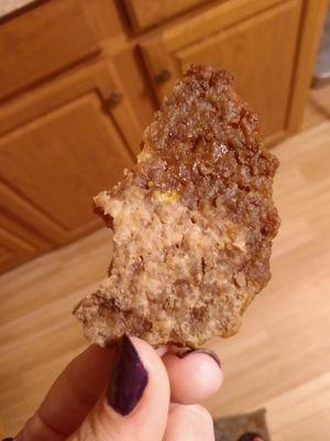 Old burger with discoloration.