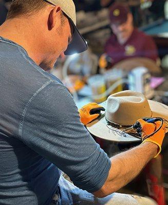 Hat burning - customize your own hat with our hat burning workshop!