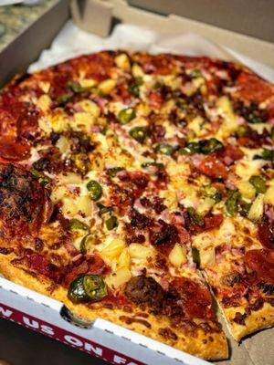 The Hawaiian with pepperoni and jalapeño. Muy fantastico, brah