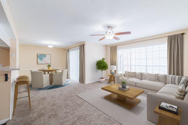Living and Dining Rooms in One Bedroom Unit + Den