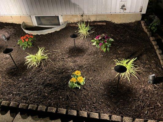 Glenn Lawn Service LLC provided our client with a beautiful flowerbed design.