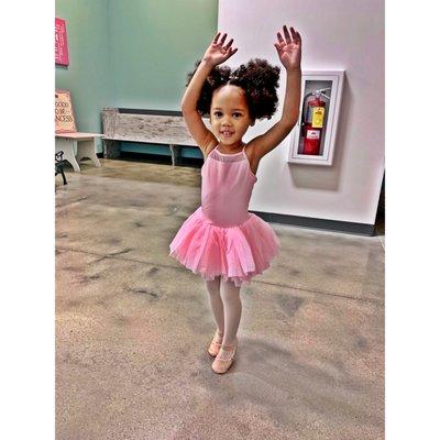 Our little one right before her first class. She was so excited and the staff made her feel so welcomed. What an incredible school!