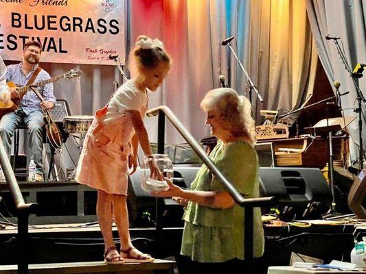 Every show a young member of our audience will draw winners from the audience to receive a special souvenir to take home with them.