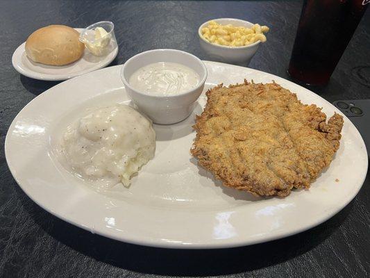 Texas Size Chicken Fried Steak with mashed potatoes and Mac n cheese