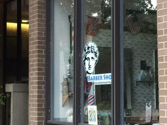Wow! So how about this displayed Confederate battle flag? Feels super welcoming at Lake Anne Hair Design in Reston, Va.