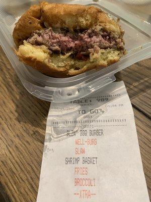 Raw hamburger sold as well done.