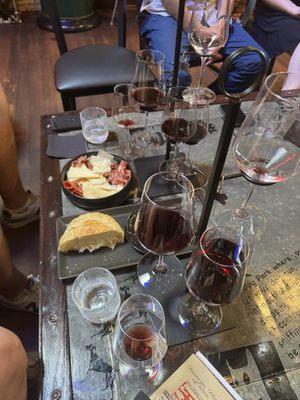 Red wine flight, charcuterie, and bread