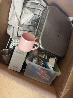 Kitchen mixed with bathroom packing.